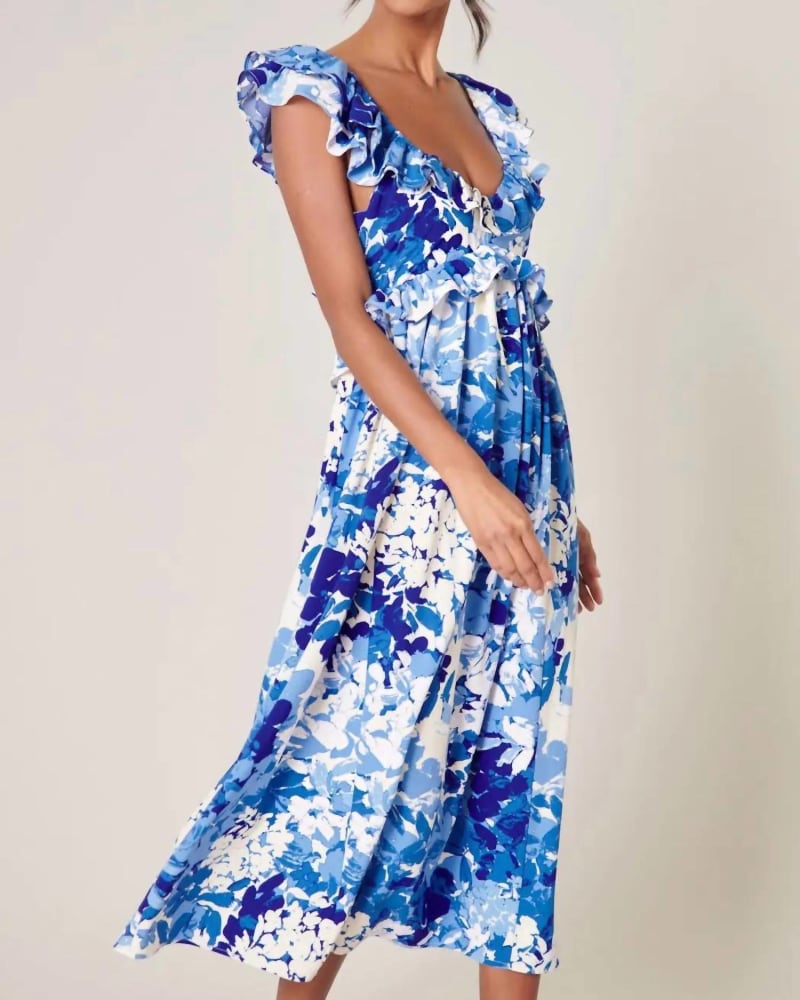 Front of a model wearing a size Large Beauty And Grace Floral Midi Dress In Blue And Ivory in Blue And Ivory by SugarLips. | dia_product_style_image_id:344705